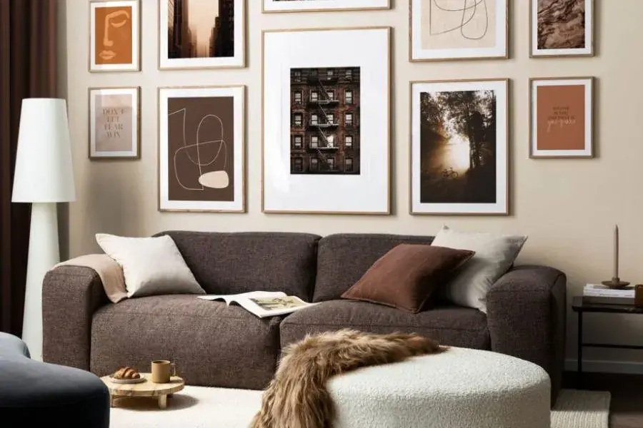 Light colored brown themed living room with pictures as wall decors